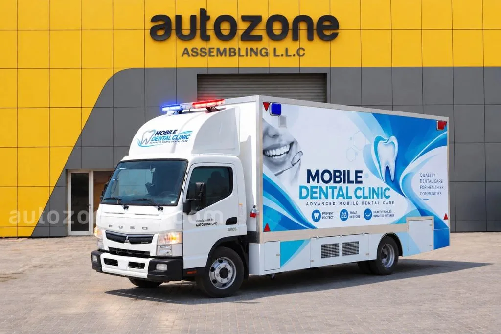 Mobile dental clinic truck on a Mitsubishi Fuso Canter chassis with blue dental branding and roof light bar